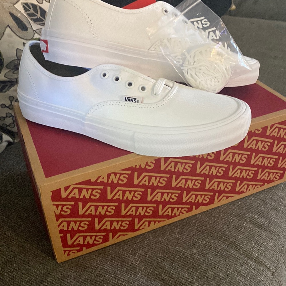 Brand New white Vans. Never been worn. Original box!
